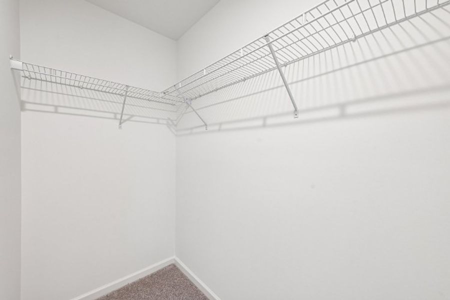 A white wall with a vent. A white wall with a vent.