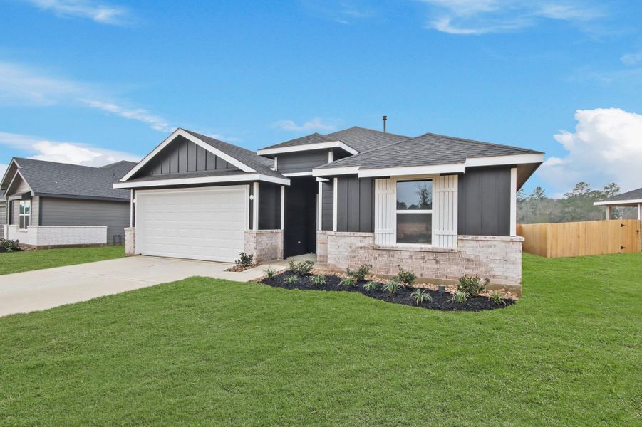 Front exterior of a new home in Chapel Lakes, Montgomery, TX, highlighting curb appeal (Image 21).