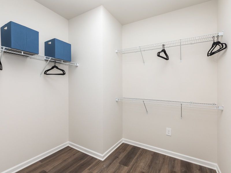 Walk in closet in the Chandler floorplan at a Meritage Homes community in Angier, NC.