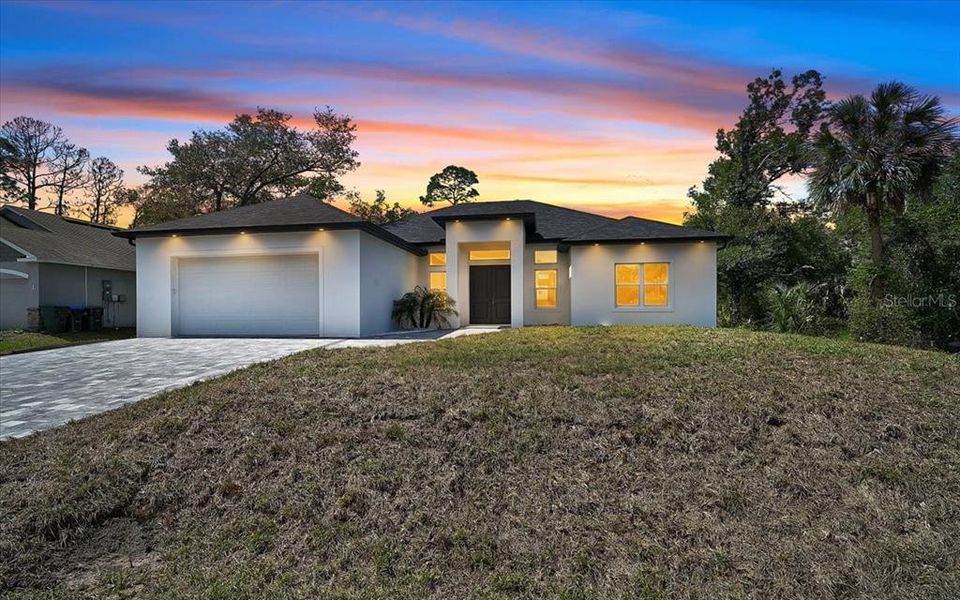 Front exterior of a new home in , North Port, FL, highlighting curb appeal (Image 22).