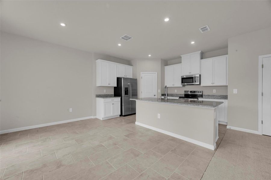 Furnished interior view inside a new home in Central Park, Port St. Lucie (Image 5).
