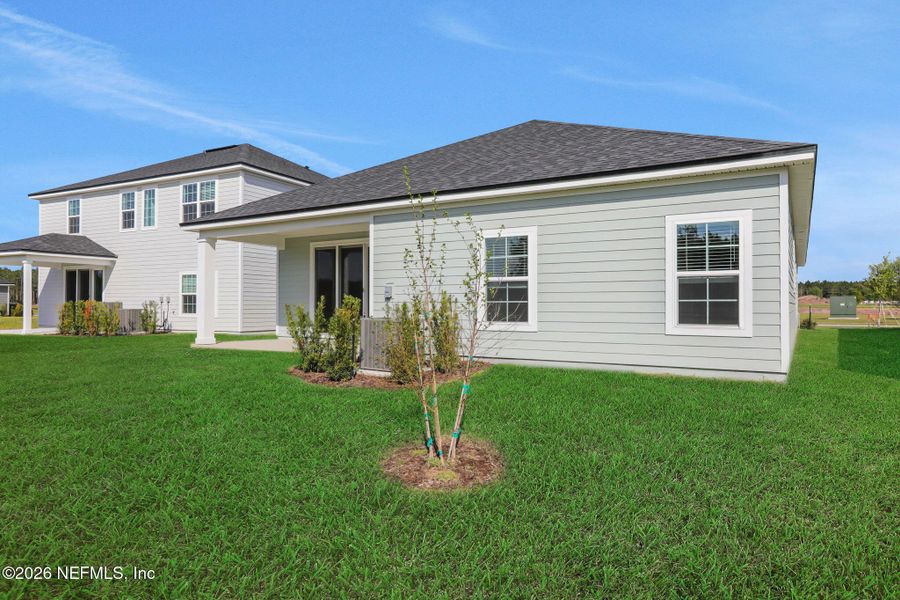 Exterior details and patio area of a home in Amberly, Green Cove Springs (Image 26).