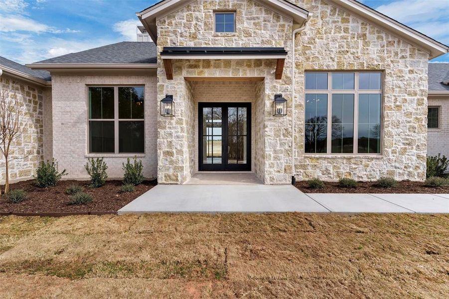 Exterior details and patio area of a home in , Granbury (Image 27).