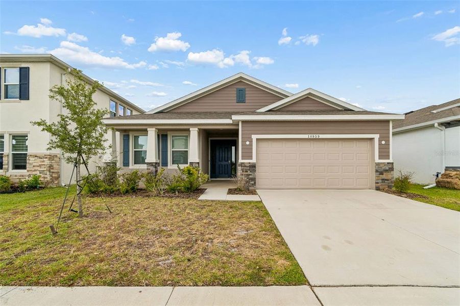 Front exterior of a new home in Mirada, San Antonio, FL, highlighting curb appeal (Image 18).