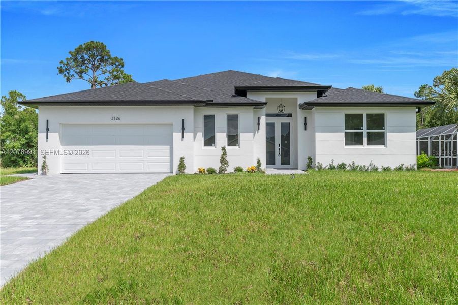 Front exterior of a new home in , North Port, FL, highlighting curb appeal (Image 24).