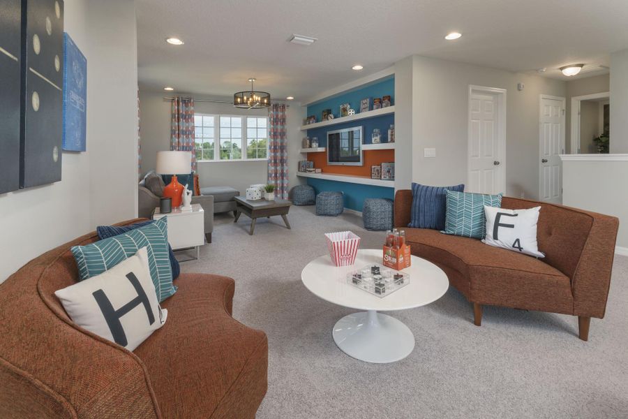 Representative furnished interior of a home built from the Wilshire by Risewell Homes in Harrell Oaks, Orlando (Image 6).