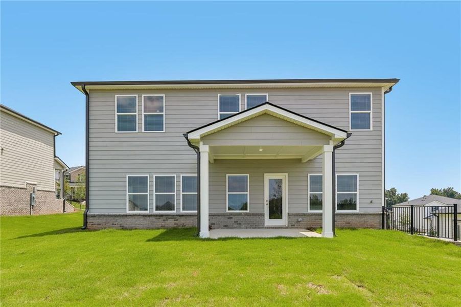 Exterior details and patio area of a home in Preserve at Mountain Creek, Pendergrass (Image 21).