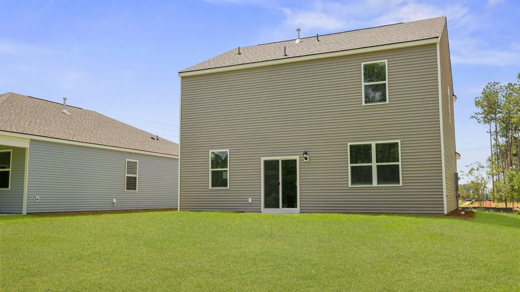 Front exterior of a new home in Pineview North, Summerville, SC, highlighting curb appeal (Image 24).