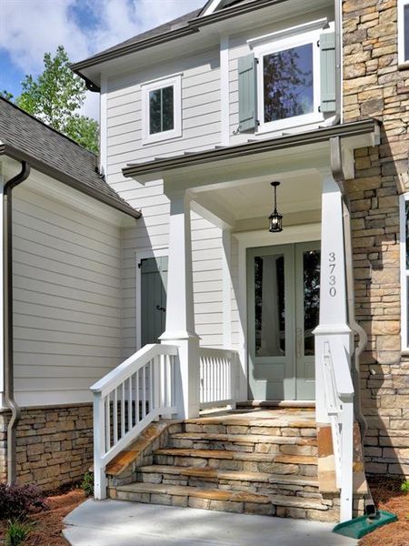 Front exterior of a new home in , Cumming, GA, highlighting curb appeal (Image 25). Front exterior of a new home in , Cumming, GA, highlighting curb appeal (Image 25).