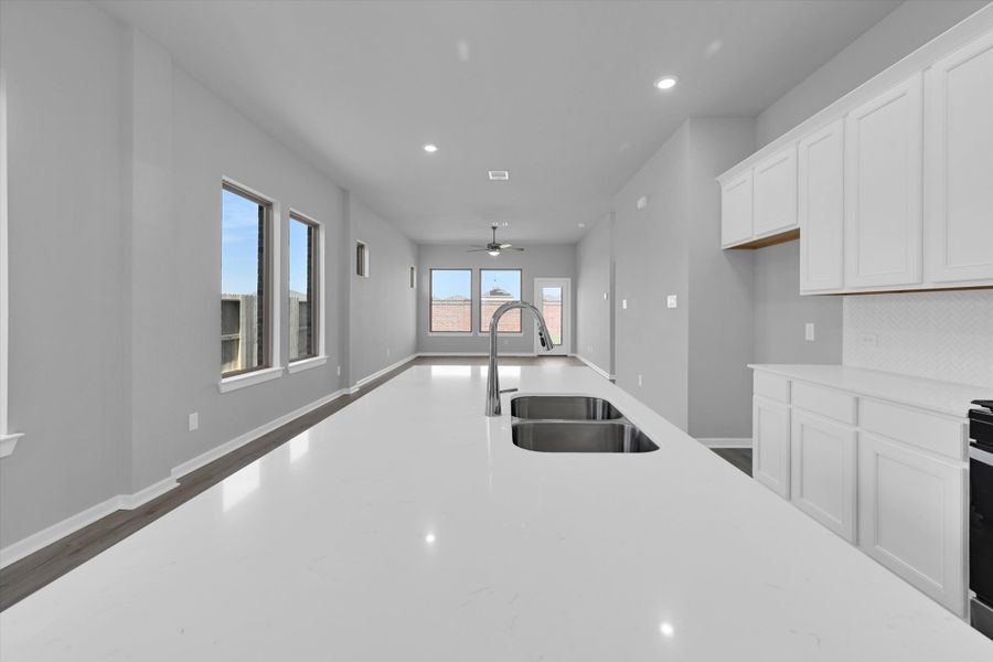 Furnished interior view inside a new home in Sunterra 40, Katy (Image 14).