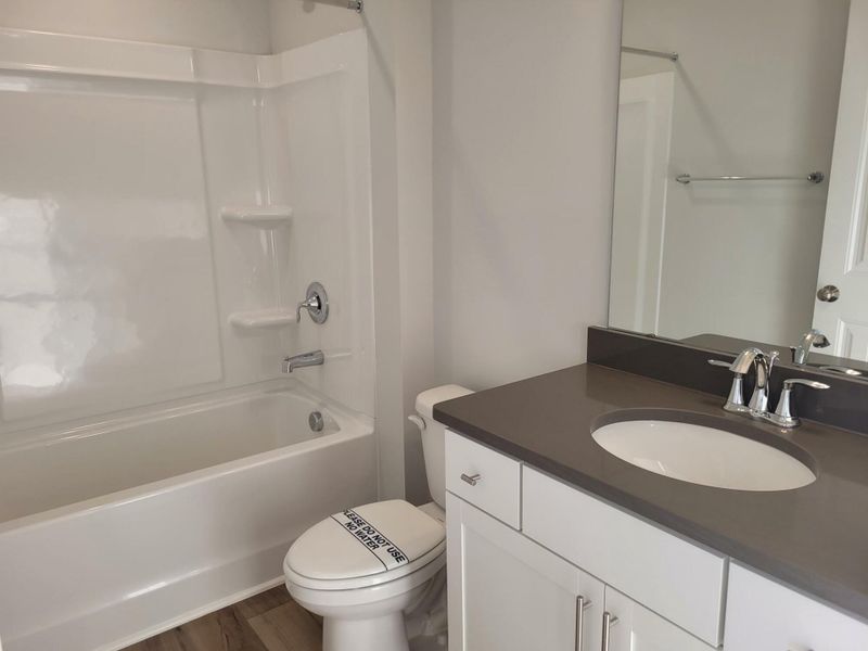 Furnished interior view inside a new home in 1158 Place Townhomes, Wilson (Image 7).