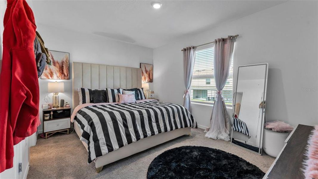 Furnished interior view inside a new home in Farm at Varrea, Plant City (Image 17).