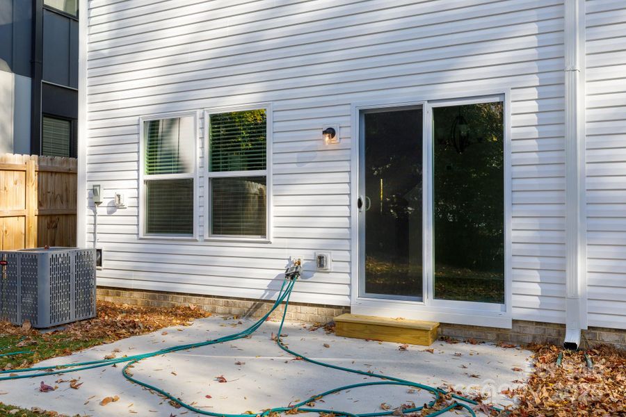 Exterior details and patio area of a home in , Charlotte (Image 3).