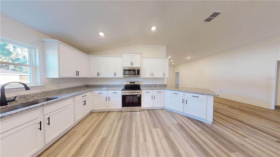 Furnished interior view inside a new home in , Alachua (Image 15).