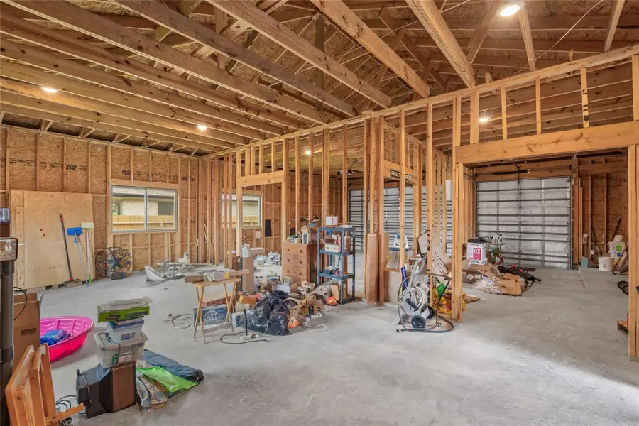 This oversized 3-car garage offers an extraordinary amount of space — easily accommodating vehicles, a boat, watercraft, and all the gear that comes with coastal living. The expansive footprint and soaring ceiling height make it equally suited as a workshop, storage haven, or the ultimate hobby space for the buyer who lives life to the fullest on and off the water. This oversized 3-car garage offers an extraordinary amount of space — easily accommodating vehicles, a boat, watercraft, and all the gear that comes with coastal living. The expansive footprint and soaring ceiling height make it equally suited as a workshop, storage haven, or the ultimate hobby space for the buyer who lives life to the fullest on and off the water.