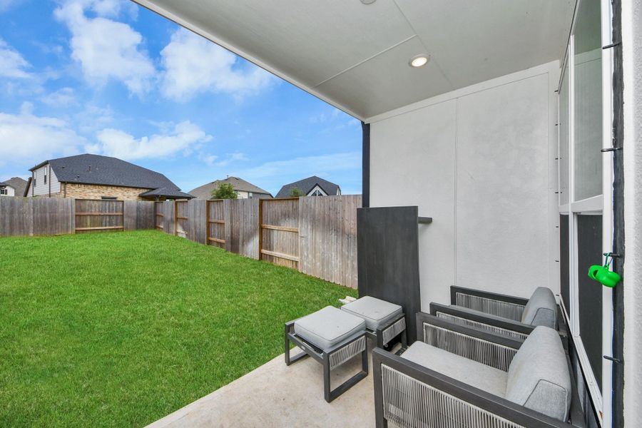Exterior details and patio area of a home in Meridiana Courtyard Collection, Manvel (Image 29).