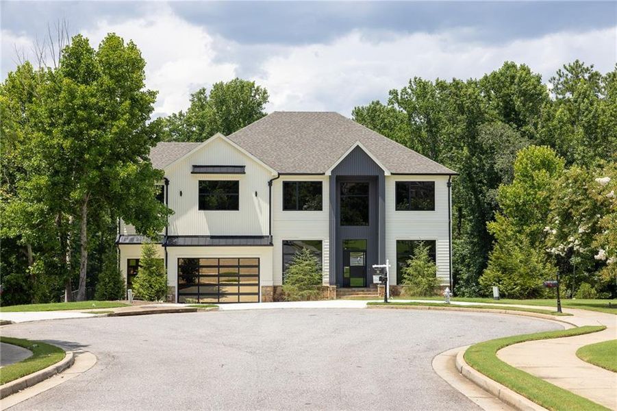 Front exterior of a new home in , Milton, GA, highlighting curb appeal (Image 30). Front exterior of a new home in , Milton, GA, highlighting curb appeal (Image 30).
