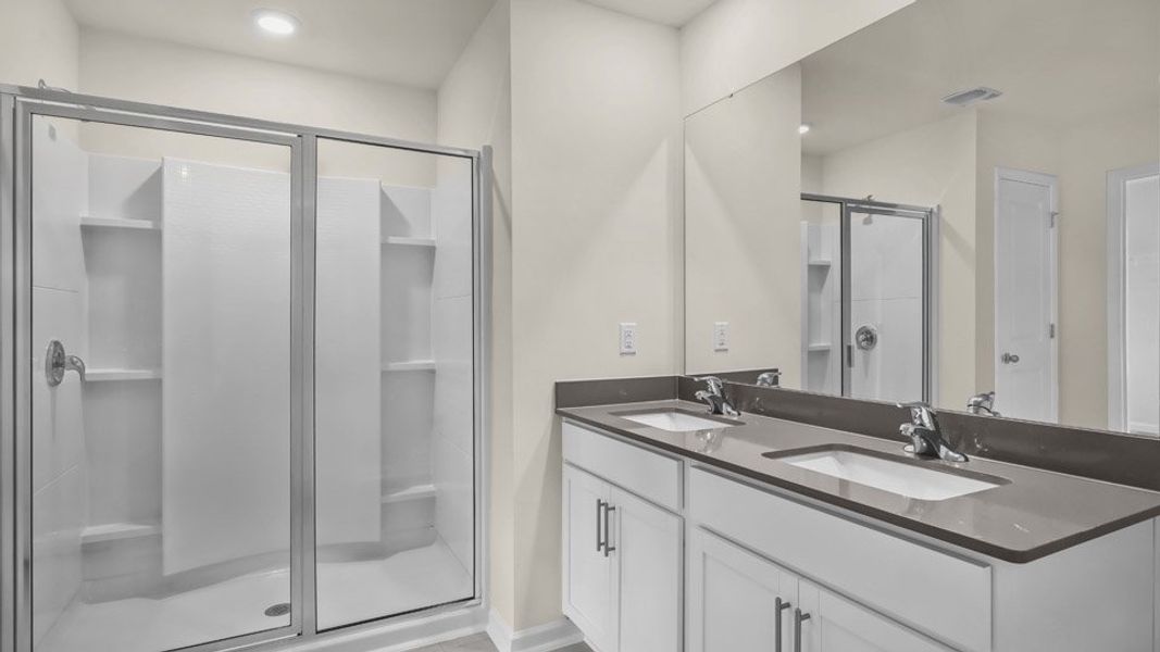 Representative furnished interior of a home built from the COLUMBIA by D.R. Horton in Galvins Ridge, Sanford (Image 6).