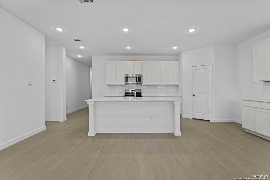 Furnished interior view inside a new home in Voss Farms, New Braunfels (Image 9).