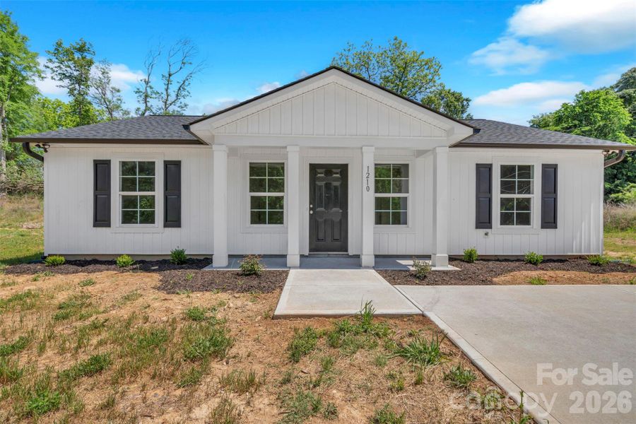 Front exterior of a new home in , Lancaster, SC, highlighting curb appeal (Image 19).