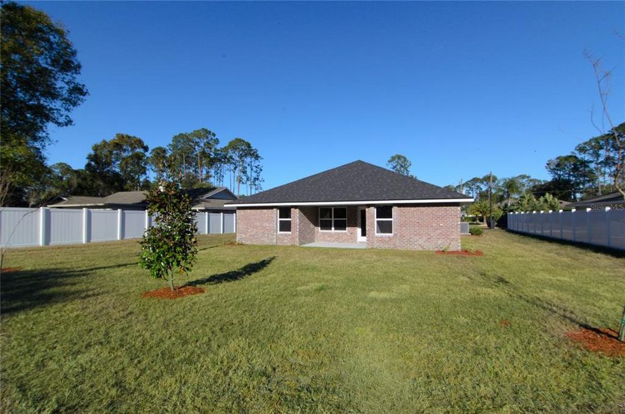 Exterior details and patio area of a home in Palm Coast, Palm Coast (Image 3).
