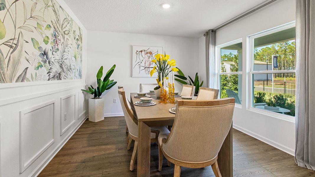 Representative furnished interior of a home built from the HAYDEN II by D.R. Horton in Copes Landing, Jacksonville (Image 6).