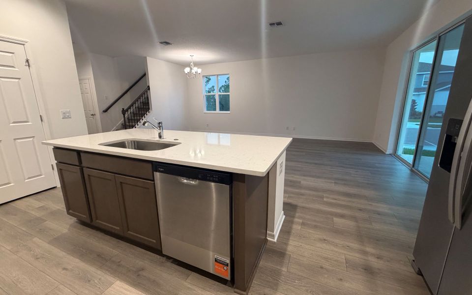Furnished interior view inside a new home in Trinity Gardens, Deland (Image 7).
