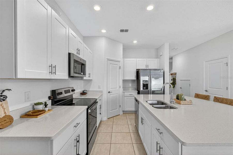 Furnished interior view inside a new home in , Kissimmee (Image 13).