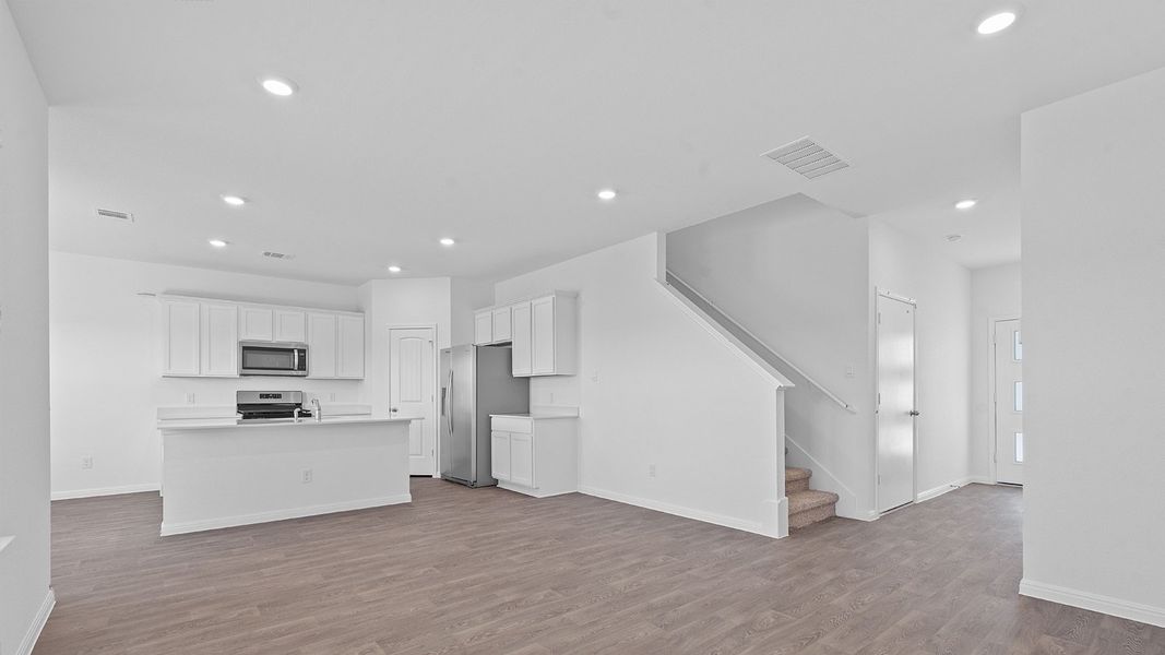Spacious, unfurnished interior of a new home in Carillon, Manor (Image 15).