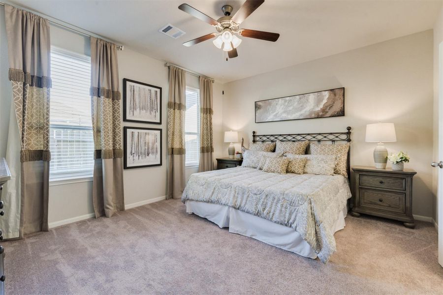 Furnished interior view inside a new home in Sunterra, Katy (Image 16).