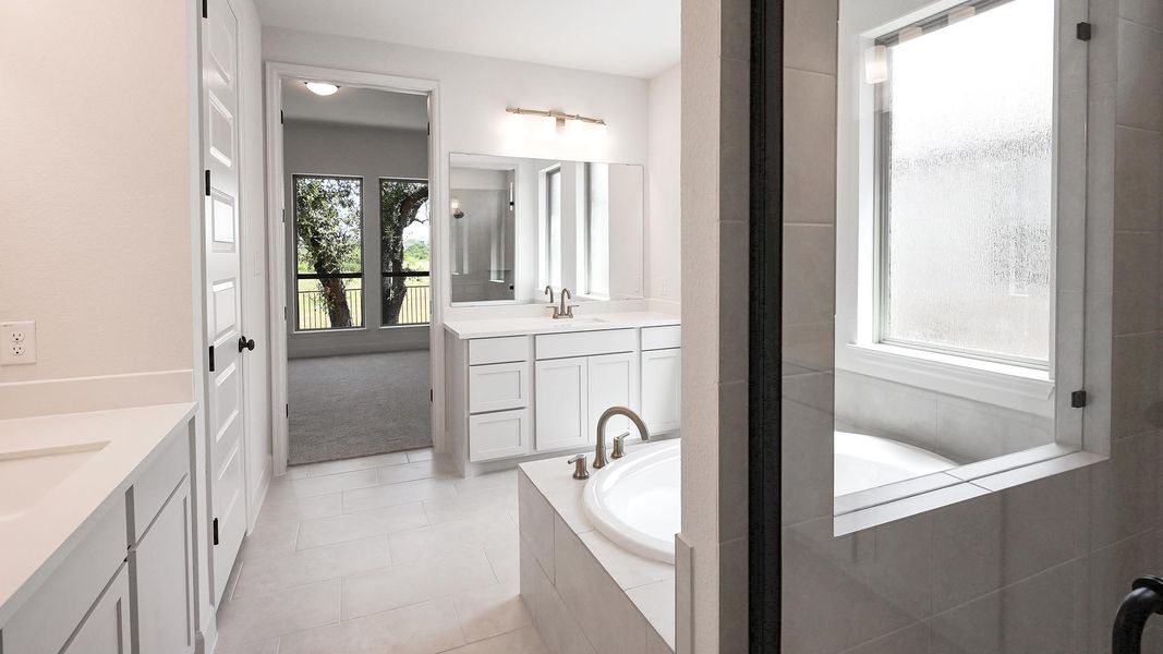 Furnished interior view inside a new home in 6 Creeks, Kyle (Image 7).