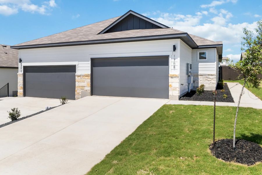 Representative exterior photo of a completed home built from the Duplex 1299 by TwoTen Communities in Amanda Park, San Antonio, TX (Image 21). Representative exterior photo of a completed home built from the Duplex 1299 by TwoTen Communities in Amanda Park, San Antonio, TX (Image 21).
