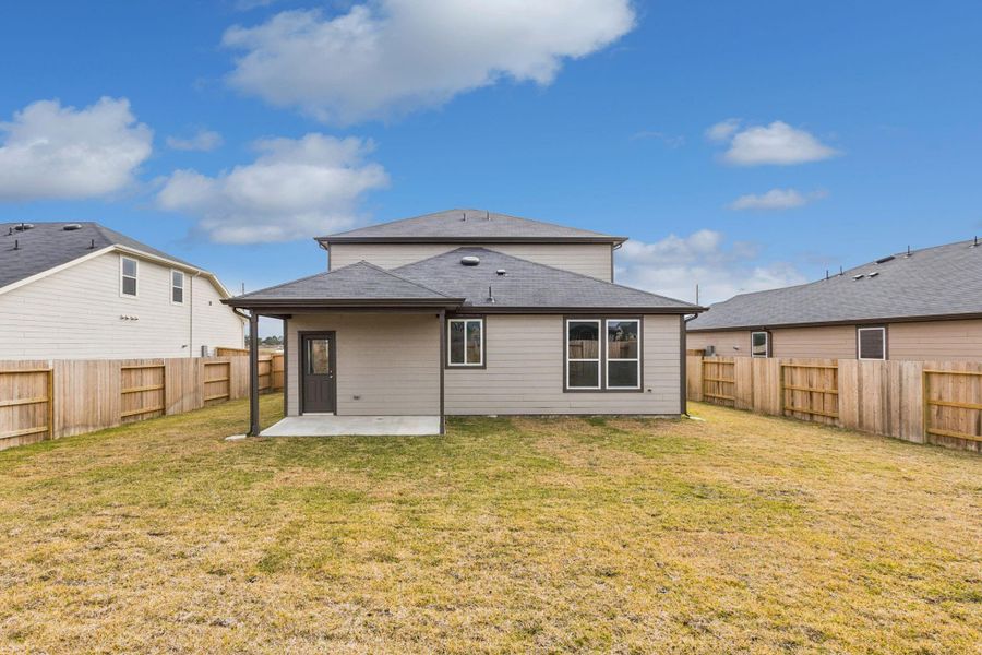 Exterior details and patio area of a home in Windcress, Cove (Image 3).