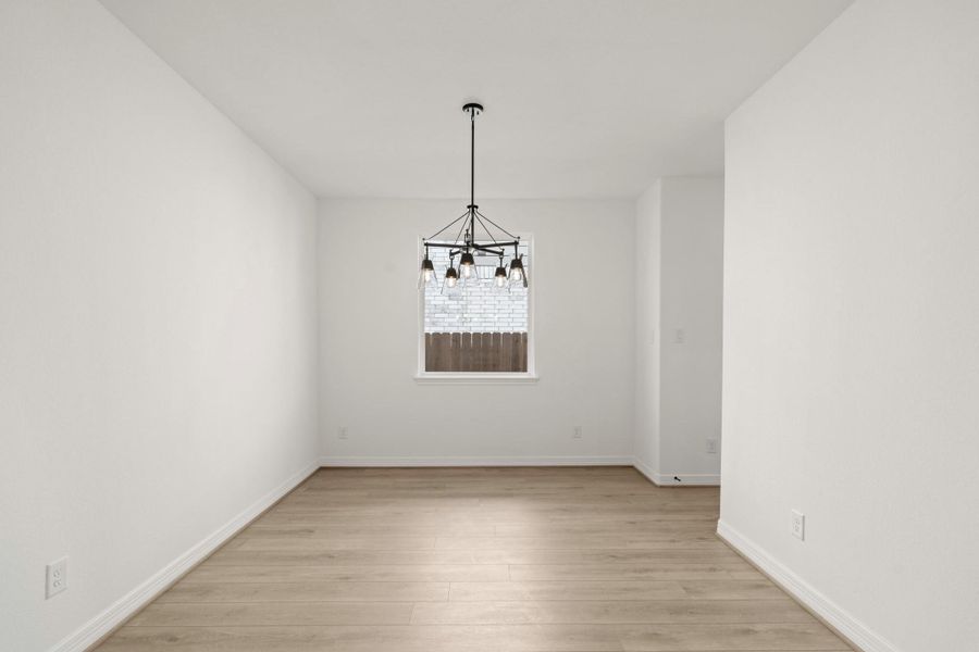 The dining area is a perfect blend of style and functionality, providing an inviting space for memorable meals and gatherings. The dining area is a perfect blend of style and functionality, providing an inviting space for memorable meals and gatherings.