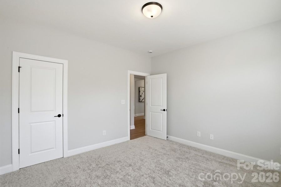 Spacious, unfurnished interior of a new home in Carrington, Stanley (Image 24).