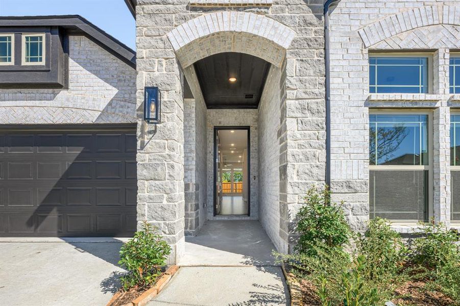 Exterior details and patio area of a home in Waterscape Classic 60s, Royse City (Image 20).