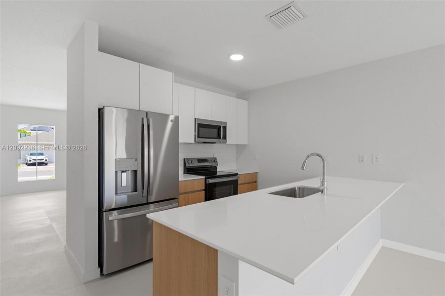 Furnished interior view inside a new home in , Miami (Image 3). Furnished interior view inside a new home in , Miami (Image 3).