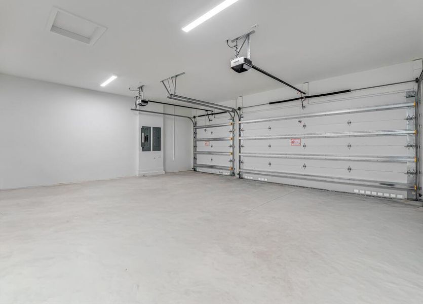 Front exterior of a new home in Apex at Avenir, Palm Beach Gardens, FL, highlighting curb appeal (Image 25). Front exterior of a new home in Apex at Avenir, Palm Beach Gardens, FL, highlighting curb appeal (Image 25).