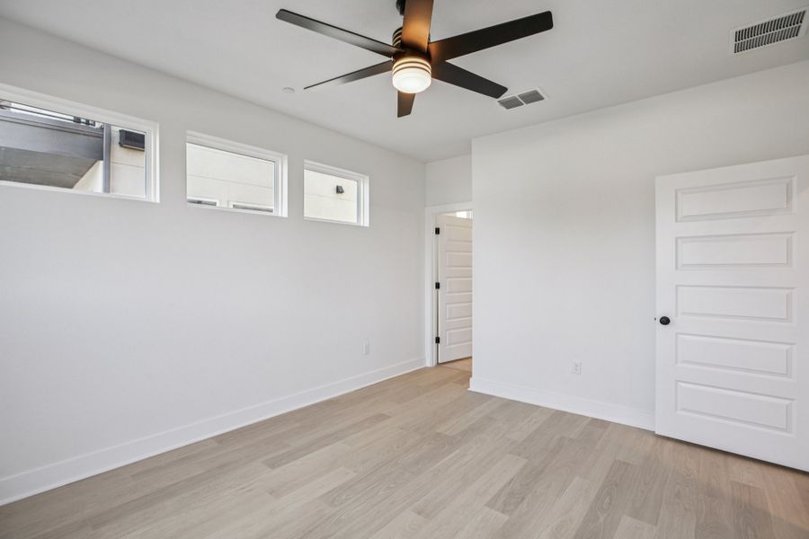 Spacious, unfurnished interior of a new home in Koenig Townhomes, Austin (Image 16).
