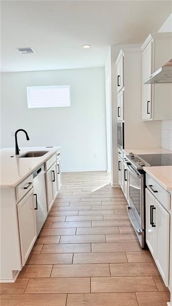 Furnished interior view inside a new home in , Palmetto (Image 10).