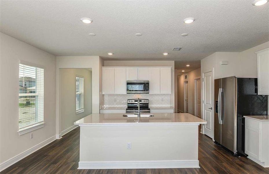 Furnished interior view inside a new home in Oakfield Lakes, Parrish (Image 3).