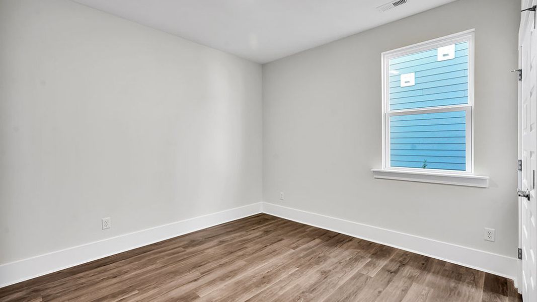 Spacious, unfurnished interior of a new home in The Haven at Indigo Preserve, Leland (Image 18).