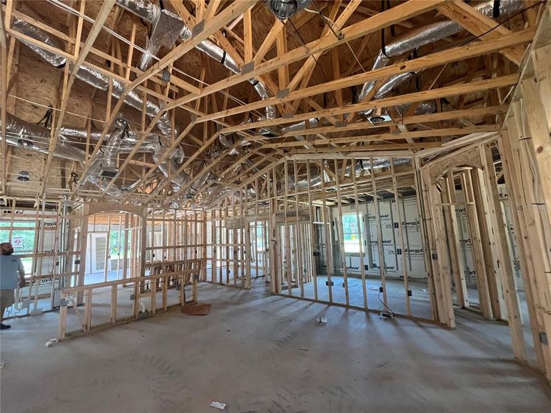 Picture of kitchen and 2 bedrooms to the right- a barn door with add privacy to the bedrooms