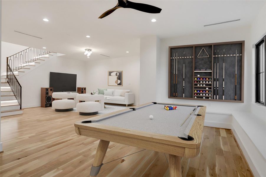 The second-floor game room and media room offer a multitude of layout options. With open space, built-in seating, and a wet bar with beverage fridge slot, you'll have the freedom to configure this space however it suits your needs. Photo is virtually staged to show you one potential layout option.