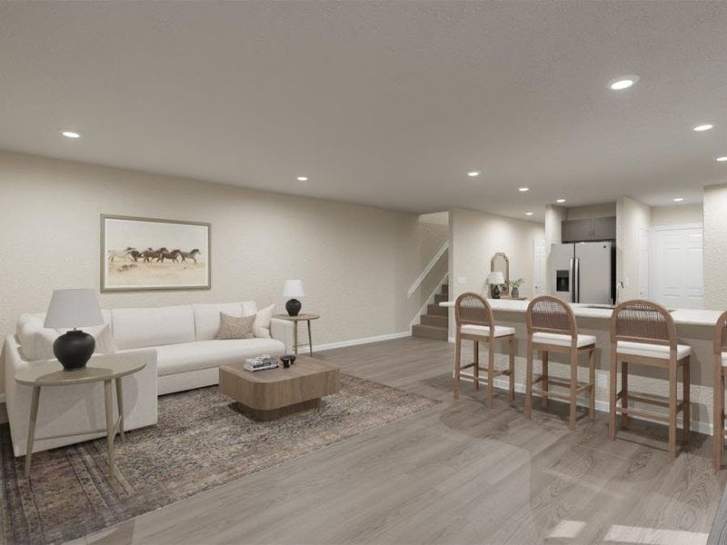 Enjoy a bright and open living area - Daisy townhome by Highland Homes (Artist`s rendering)