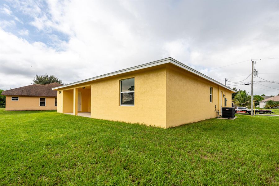 Exterior details and patio area of a home in , Port St. Lucie (Image 24). Exterior details and patio area of a home in , Port St. Lucie (Image 24).