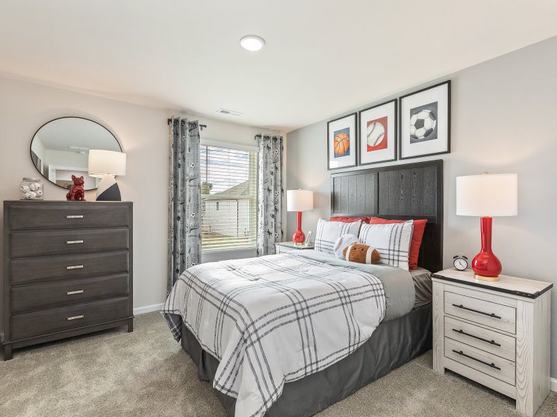 Secondary bedroom in the Chatham floorplan at a Meritage Homes community in Angier, NC.