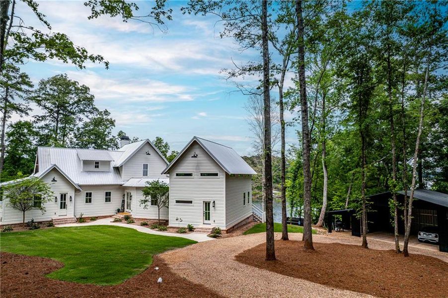 Front exterior of a new home in , Eatonton, GA, highlighting curb appeal (Image 26). Front exterior of a new home in , Eatonton, GA, highlighting curb appeal (Image 26).