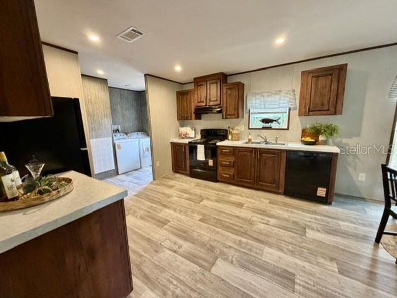Furnished interior view inside a new home in , Chiefland (Image 6).