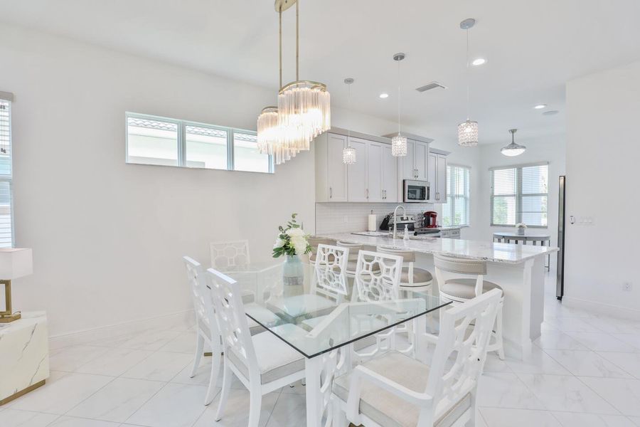 Furnished interior view inside a new home in PGA Village Verano, Port St. Lucie (Image 49).